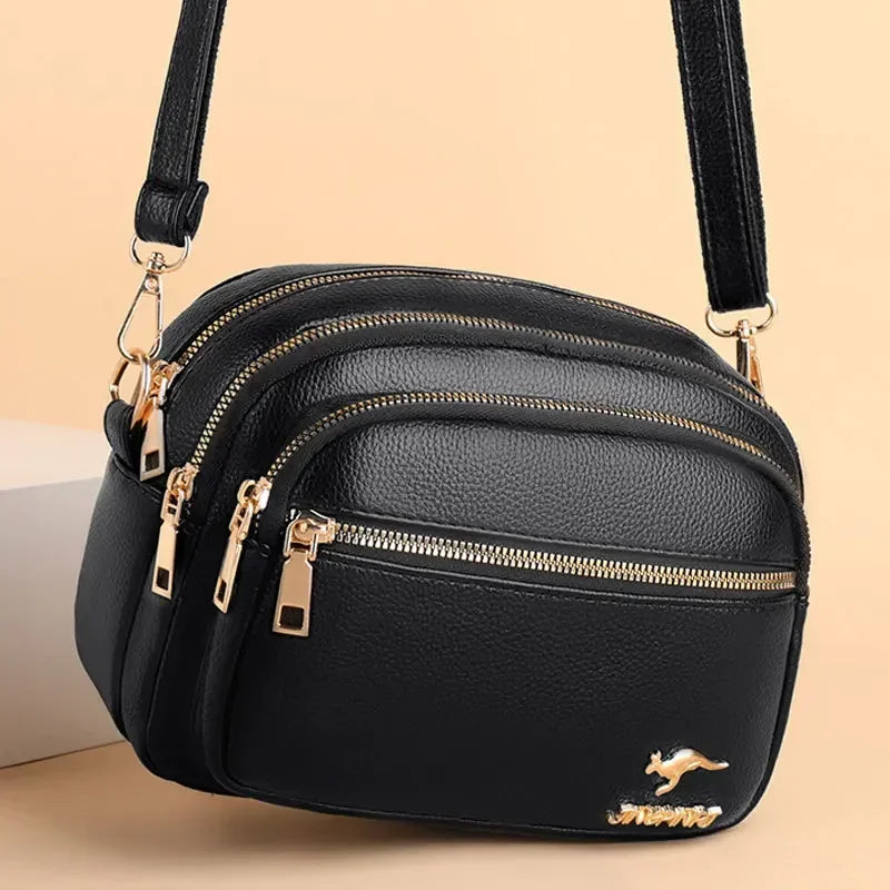 Sac bandoulière femme en similicuir multi-poches souple - Elora