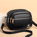 Sac bandoulière femme en similicuir multi-poches souple - Elora