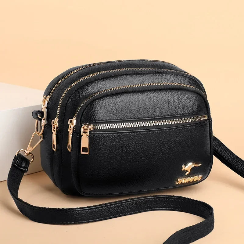 Sac bandoulière femme en similicuir multi-poches souple - Elora