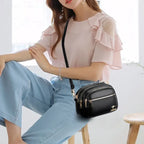 Sac bandoulière femme en similicuir multi-poches souple - Elora