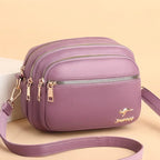Sac bandoulière femme en similicuir multi-poches souple - Elora