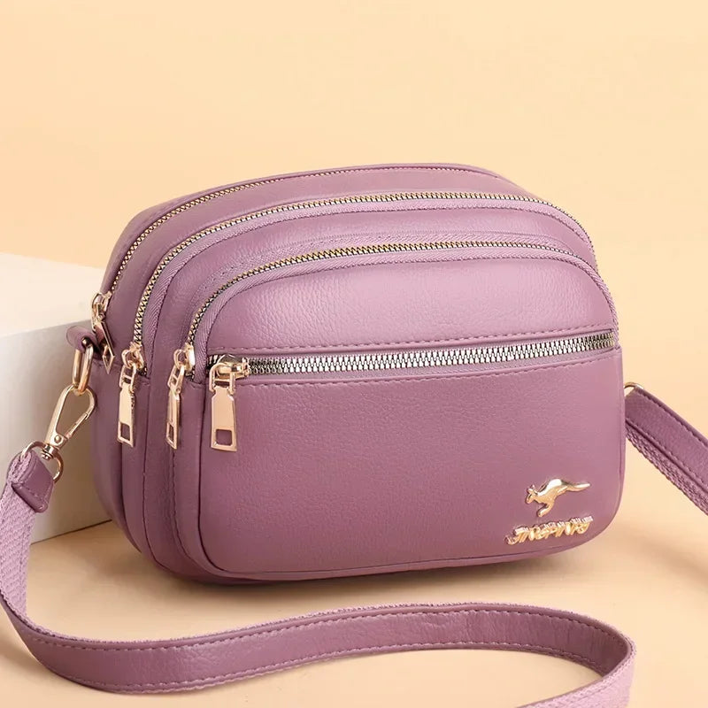 Sac bandoulière femme en similicuir multi-poches souple - Elora