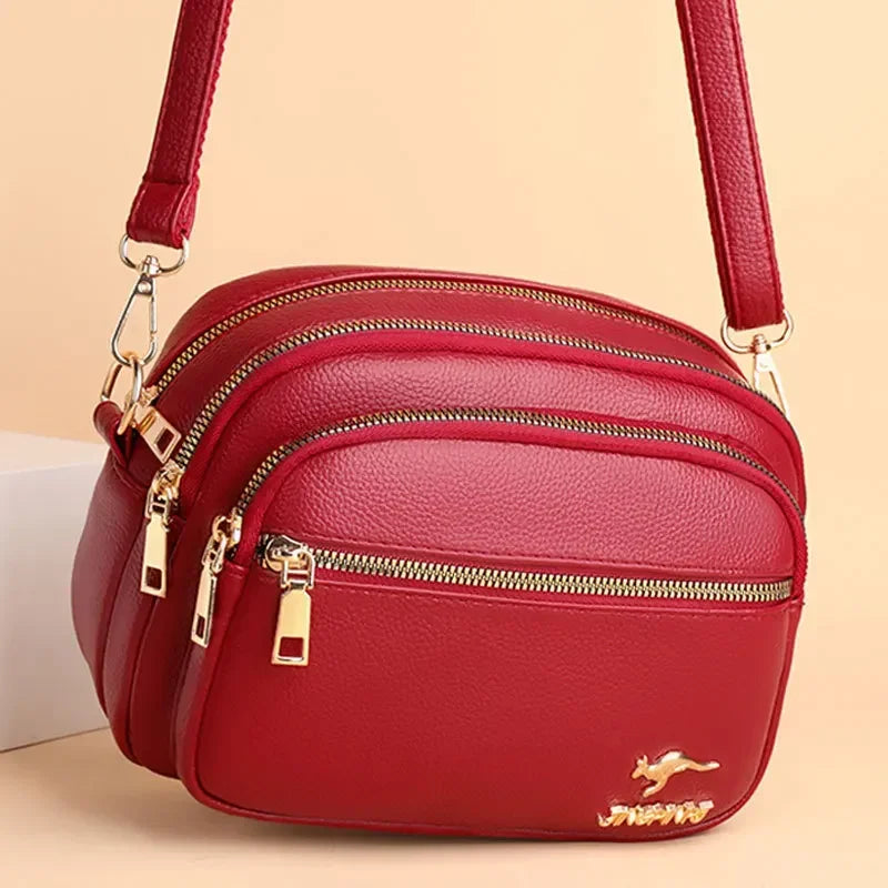 Sac bandoulière femme en similicuir multi-poches souple - Elora