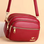 Sac bandoulière femme en similicuir multi-poches souple - Elora
