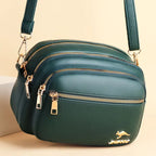 Sac bandoulière femme en similicuir multi-poches souple - Elora