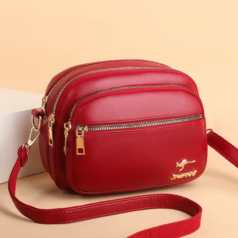 Sac bandoulière femme en similicuir multi-poches souple - Elora