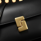 Gold S clasp close-up